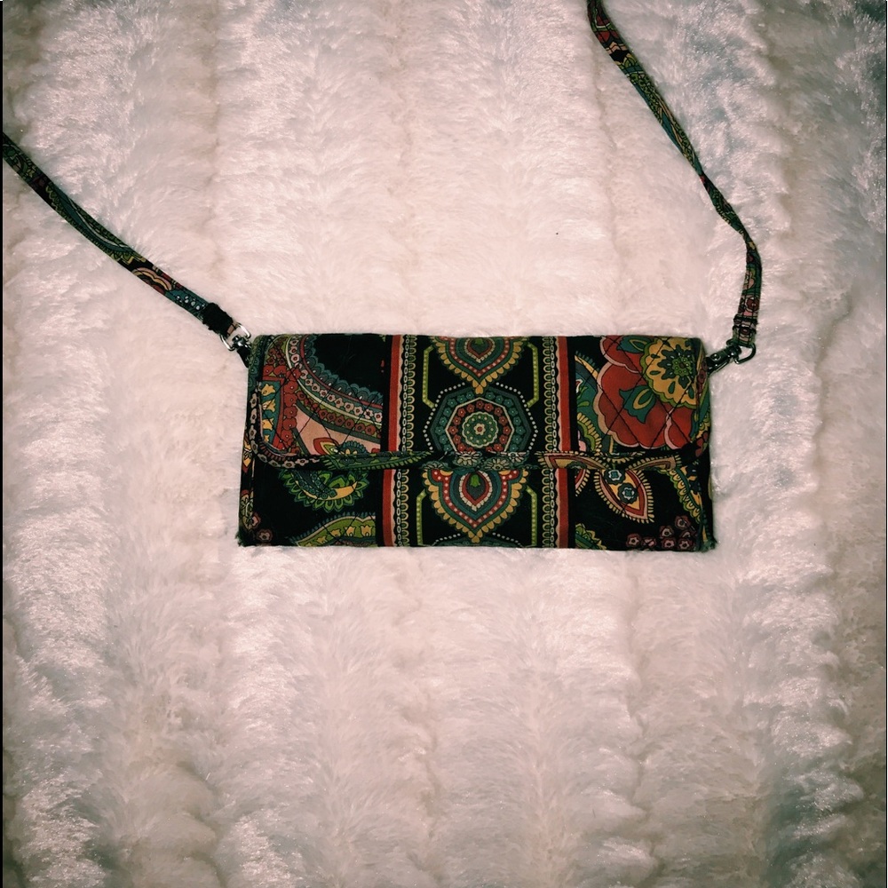 Vera Bradley wallet with shoulder strap.